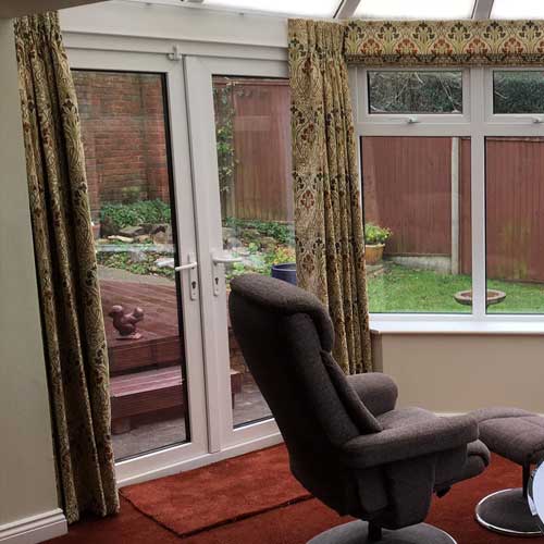 Beautiful Windows Ltd curtains on conservatory doors